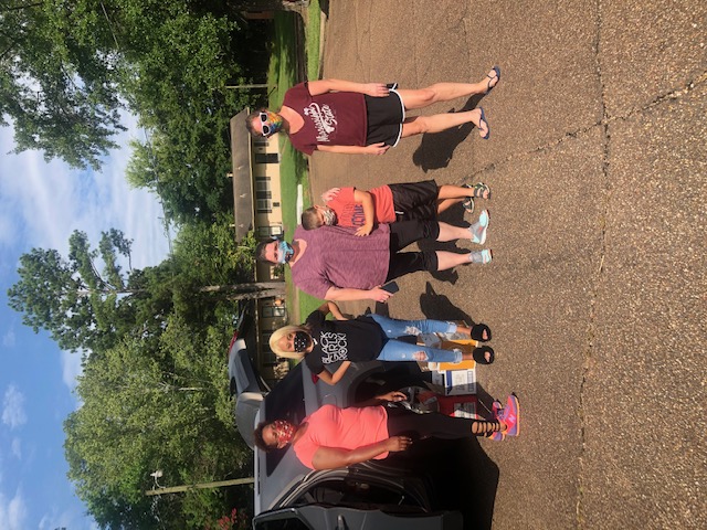 Group photo after unloading supplies